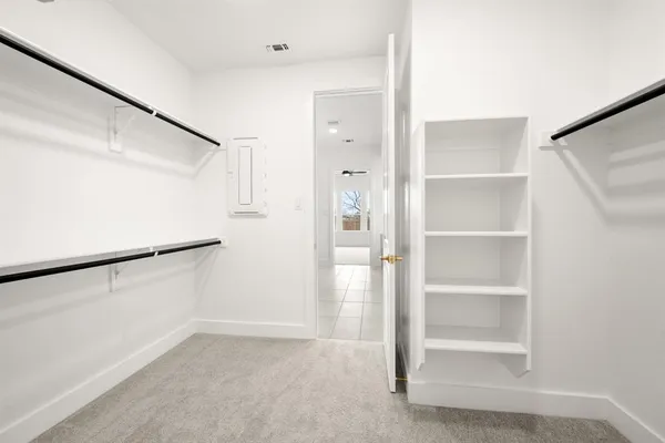 a view of an empty walk in closet