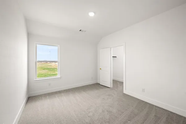 an empty room with window