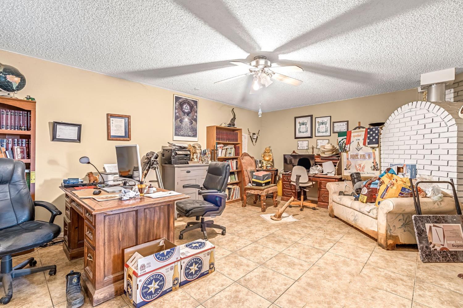 30550 Ave 20 1/2 Madera, CA 93638 - Photo 12 of 24 a very nice looking living room with furniture and a chandelier