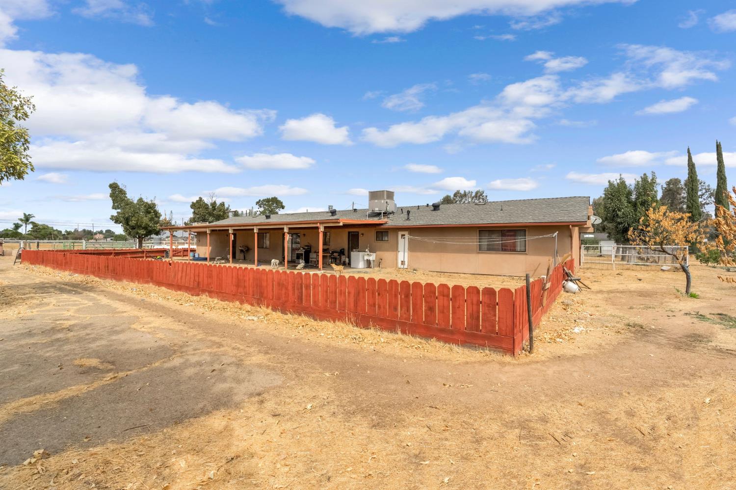 30550 Ave 20 1/2 Madera, CA 93638 - Photo 18 of 24 a view of a house with a yard