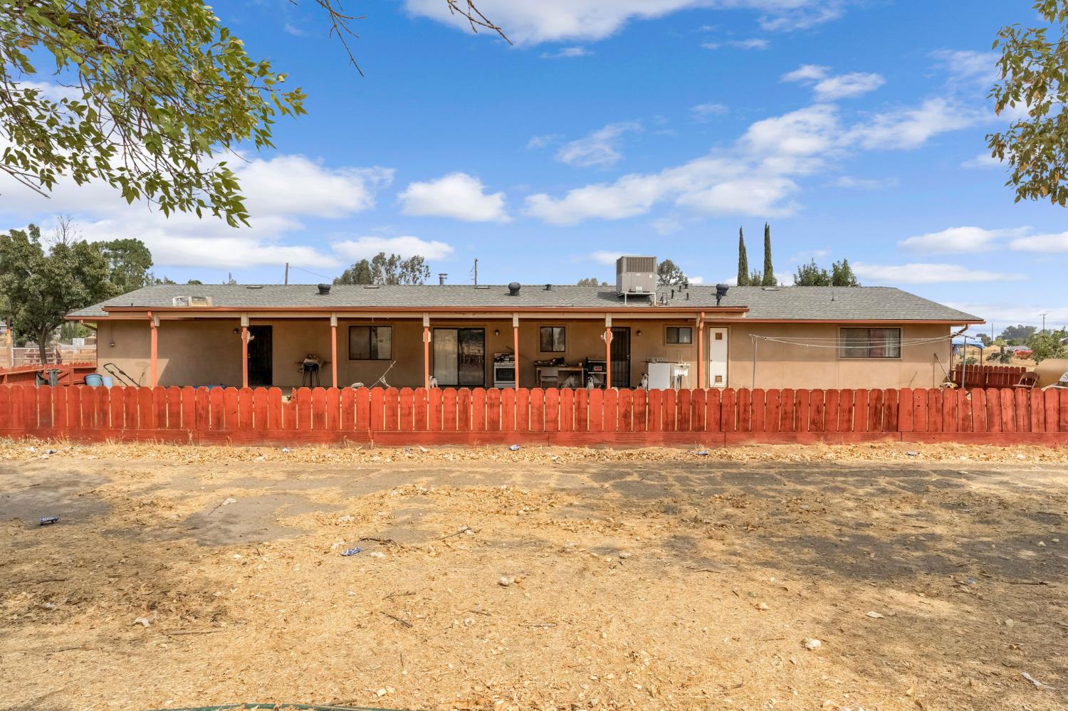 30550 Ave 20 1/2 Madera, CA 93638 - Photo 22 of 24 a view of house with a backyard