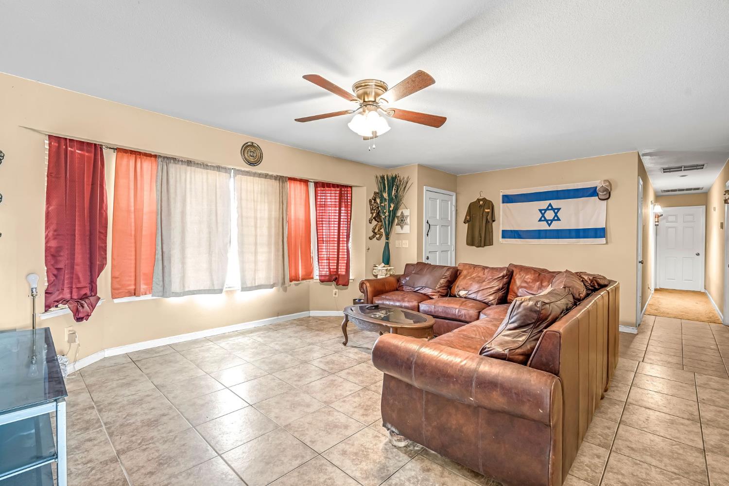 30550 Ave 20 1/2 Madera, CA 93638 - Photo 7 of 24 a living room with furniture and a large window