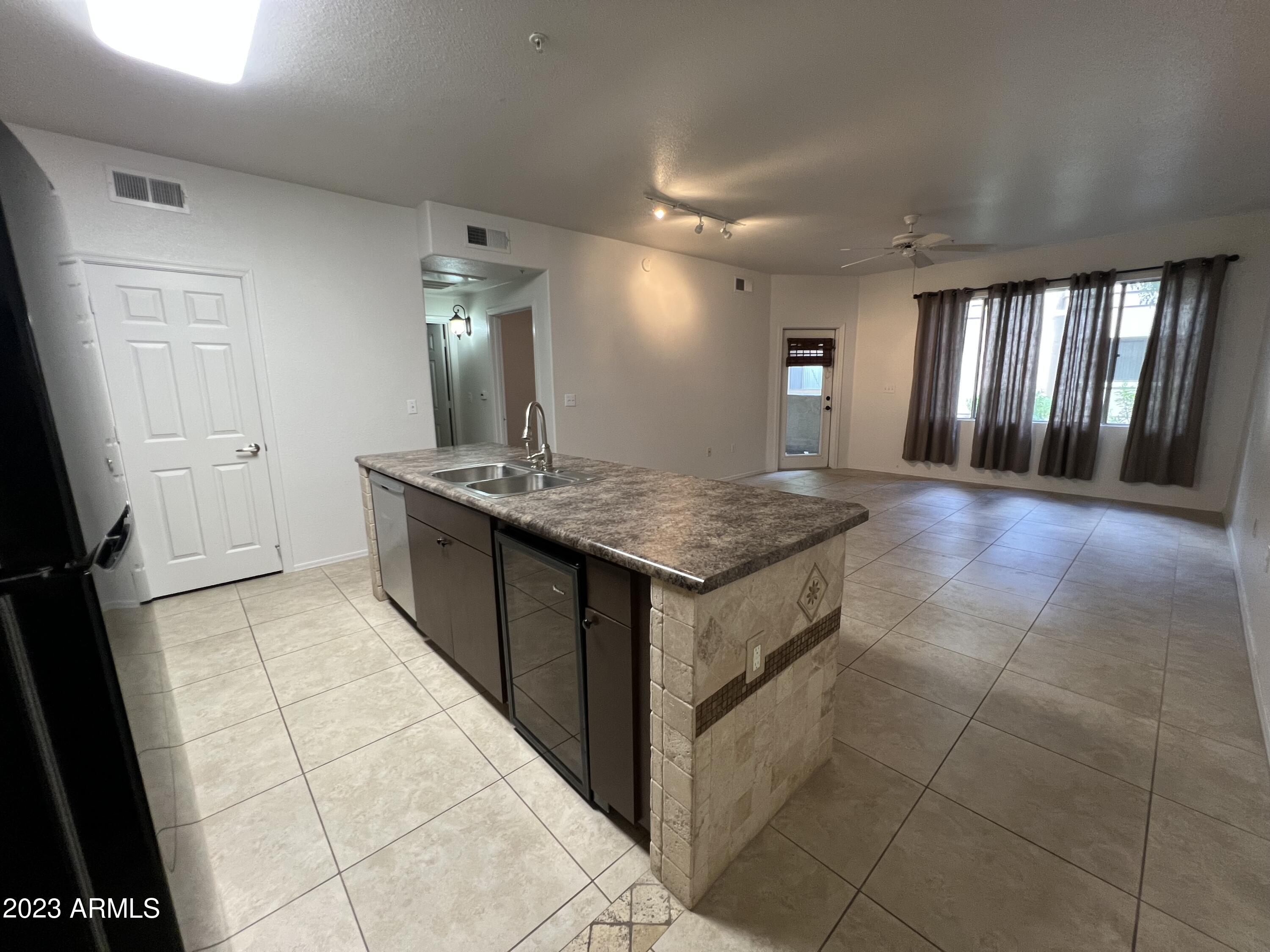 18416 North Cave Creek Road, Unit 1059 Phoenix, AZ 85032 - Photo 9 of 45 Upgraded Tile Throughout