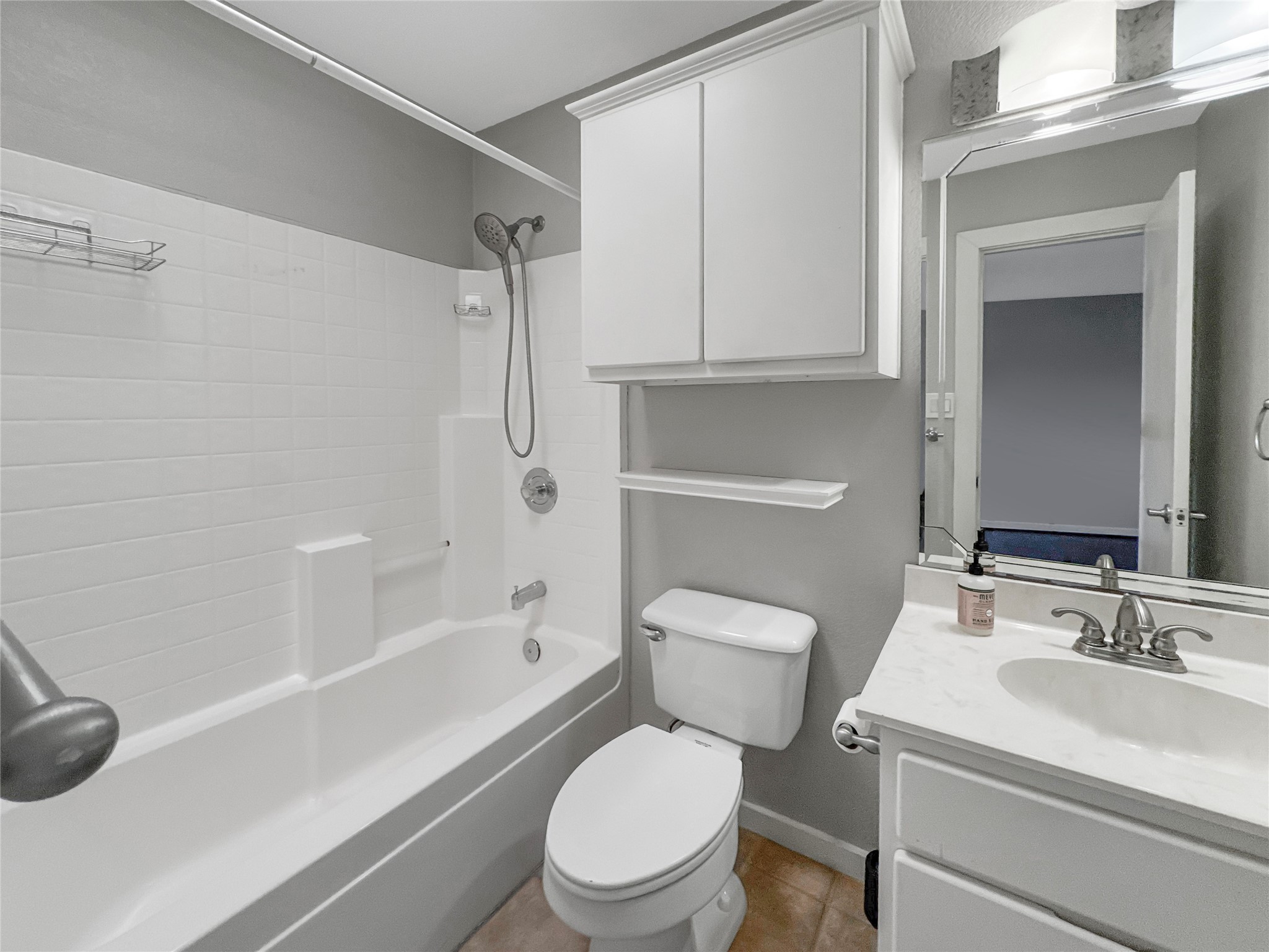 2114 Goodrich Avenue, Unit 4 Austin, TX 78704 - Photo 16 of 24 a bathroom with a sink a toilet and a bathtub