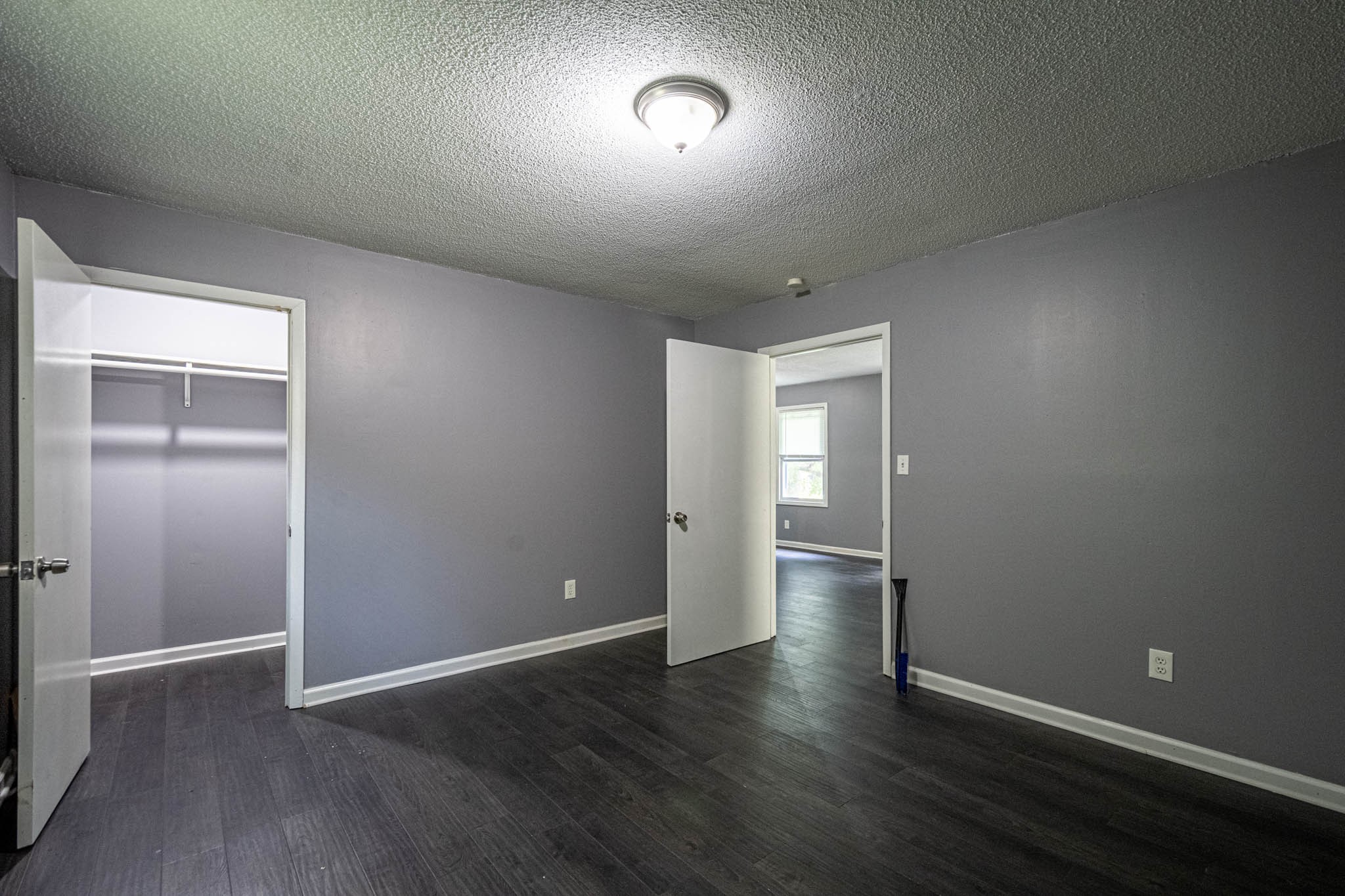 500 Bodenham Road Pulaski, TN 38478 - Photo 14 of 70 an empty room with wooden floor and windows