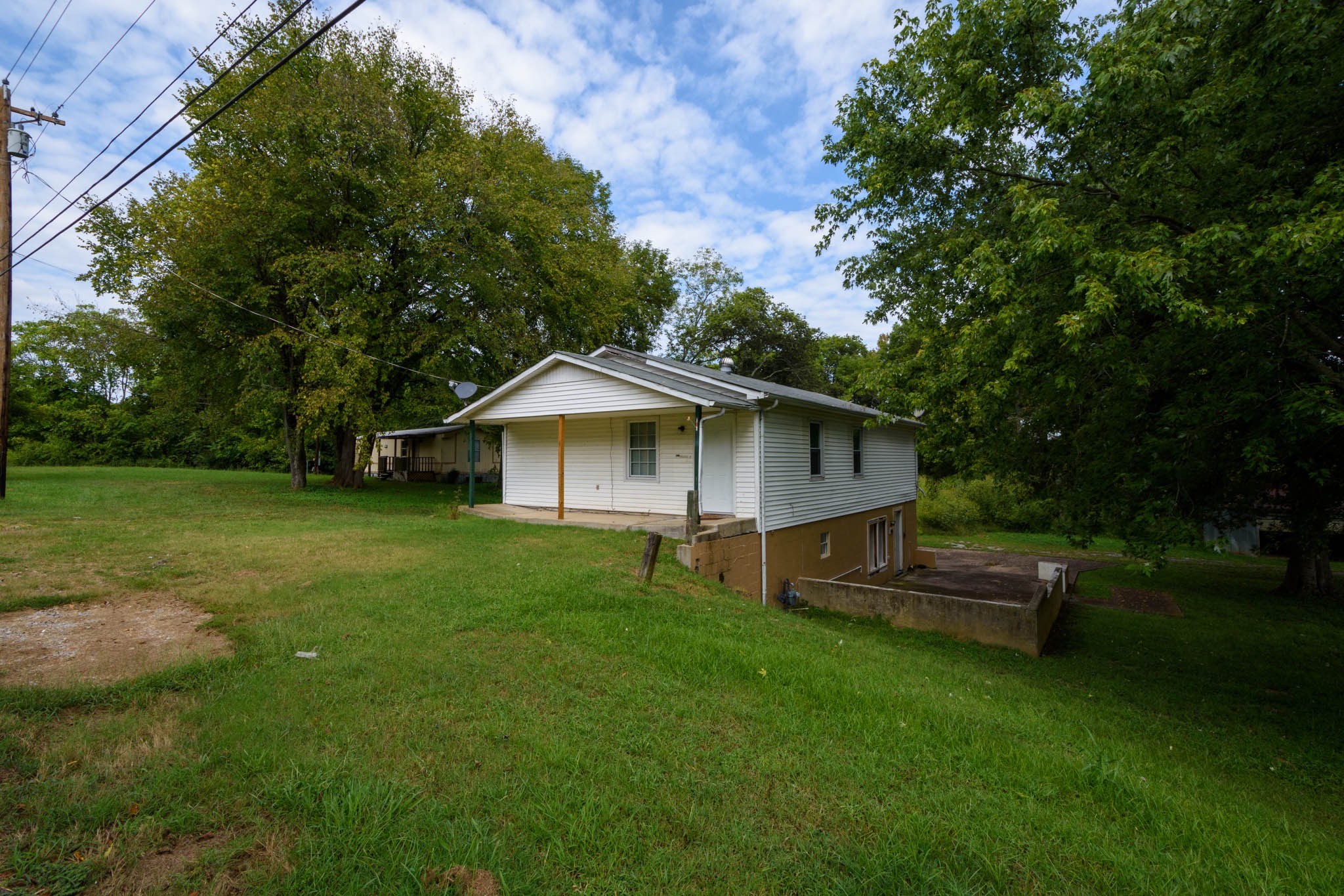 500 Bodenham Road Pulaski, TN 38478 - Photo 15 of 70 a front view of a house with garden