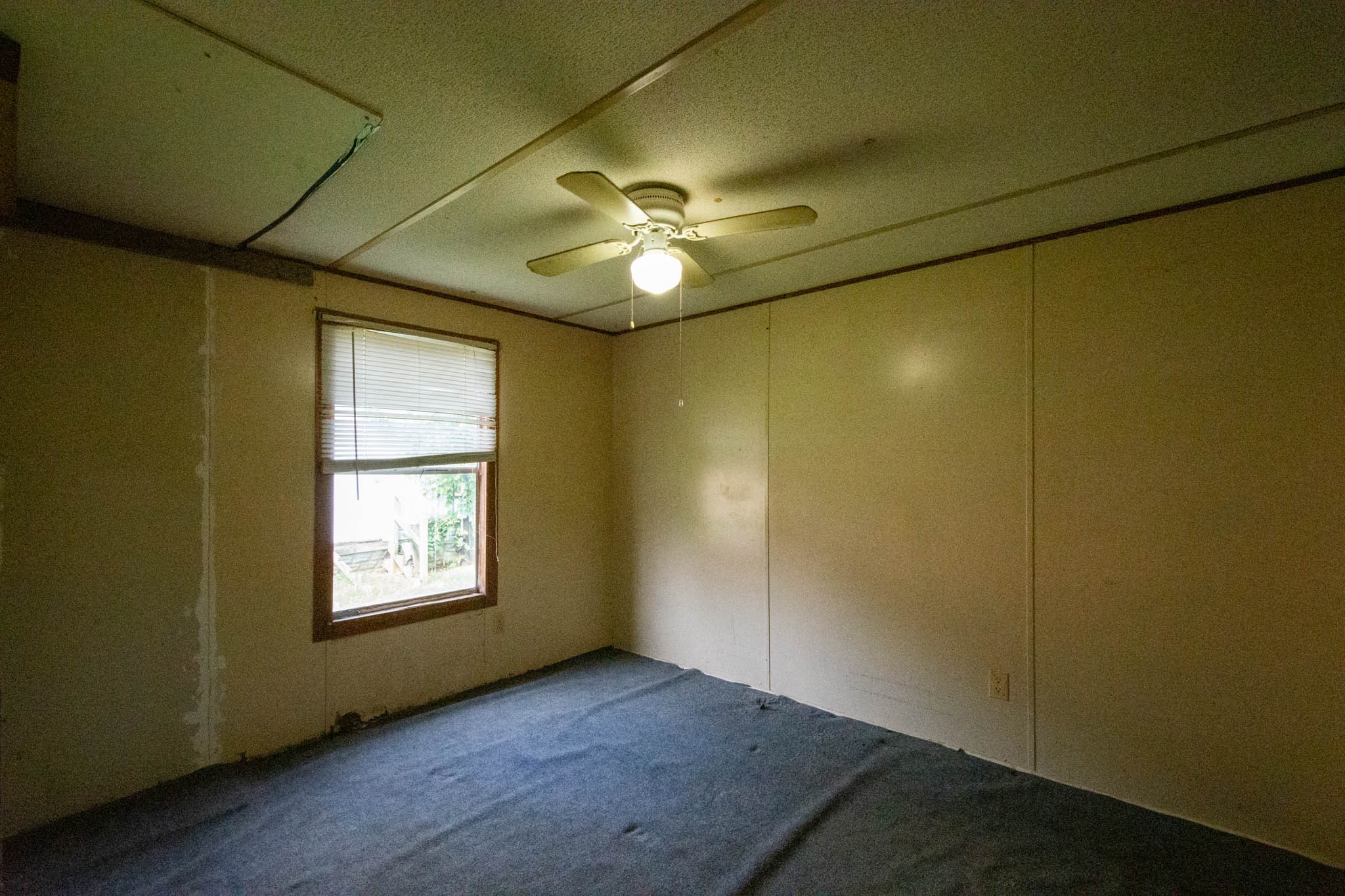 500 Bodenham Road Pulaski, TN 38478 - Photo 53 of 70 an empty room with windows and fan