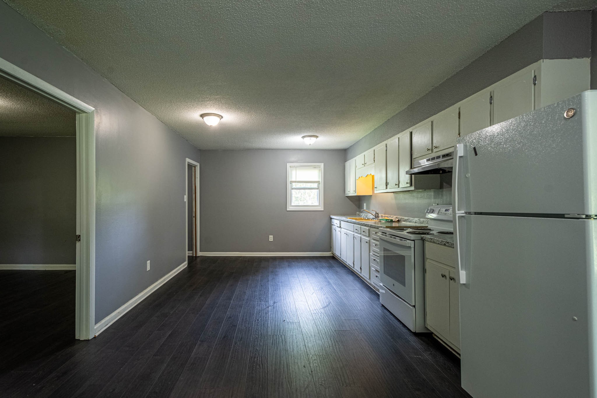 500 Bodenham Road Pulaski, TN 38478 - Photo 6 of 70 a kitchen with stainless steel appliances a refrigerator and a stove top oven