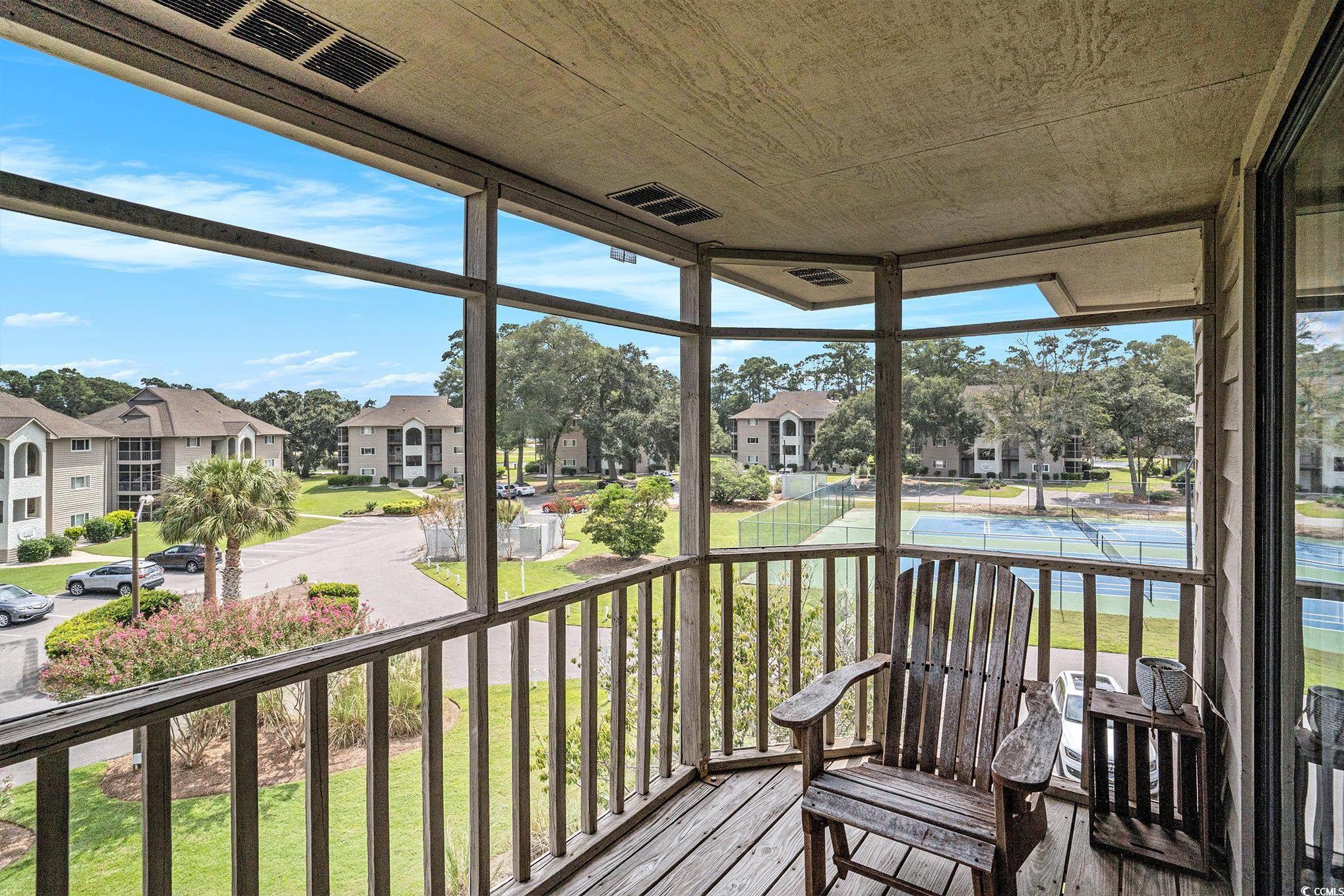 815 Colony Place, Unit 15F Sunset Beach, NC 28468 - Photo 18 of 34 View of sunroom