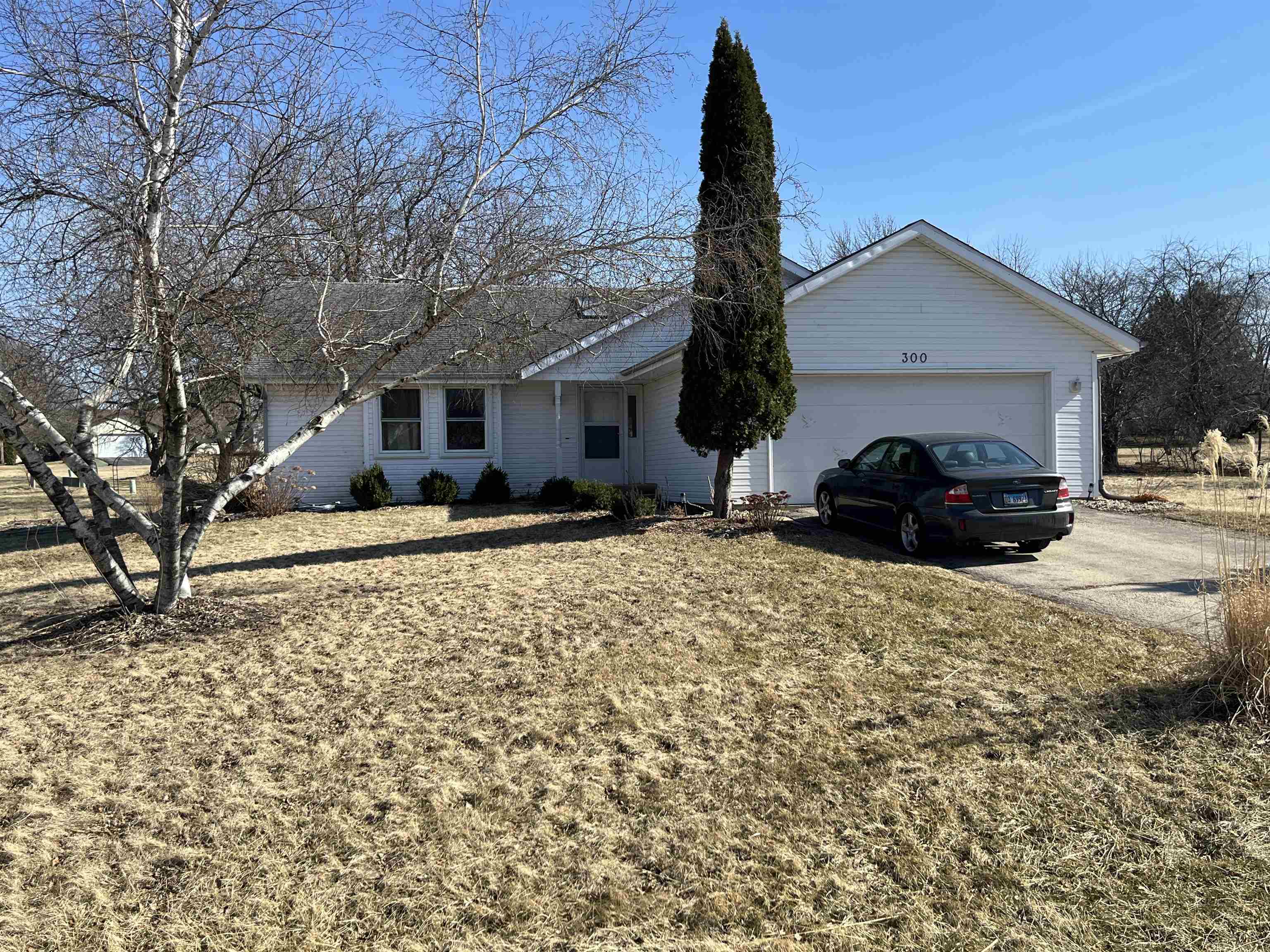 300 Lamplighter Loop Southeast Poplar Grove, IL 61065 - Photo 1 of 29 a front view of a house with a yard