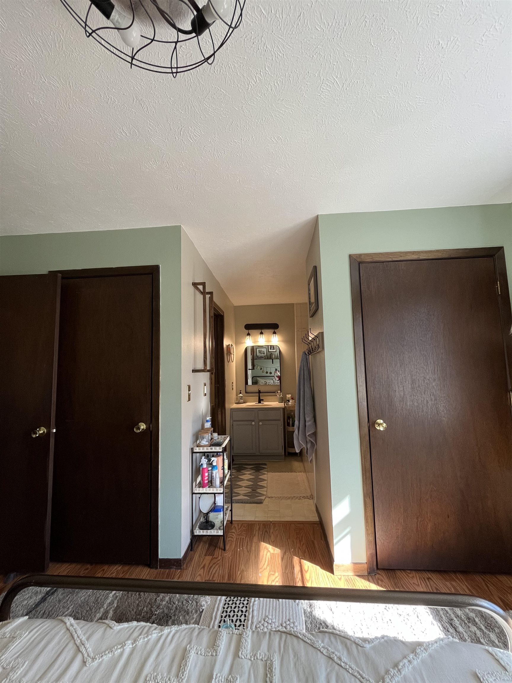 300 Lamplighter Loop Southeast Poplar Grove, IL 61065 - Photo 14 of 29 a bedroom with a bed and a mirror