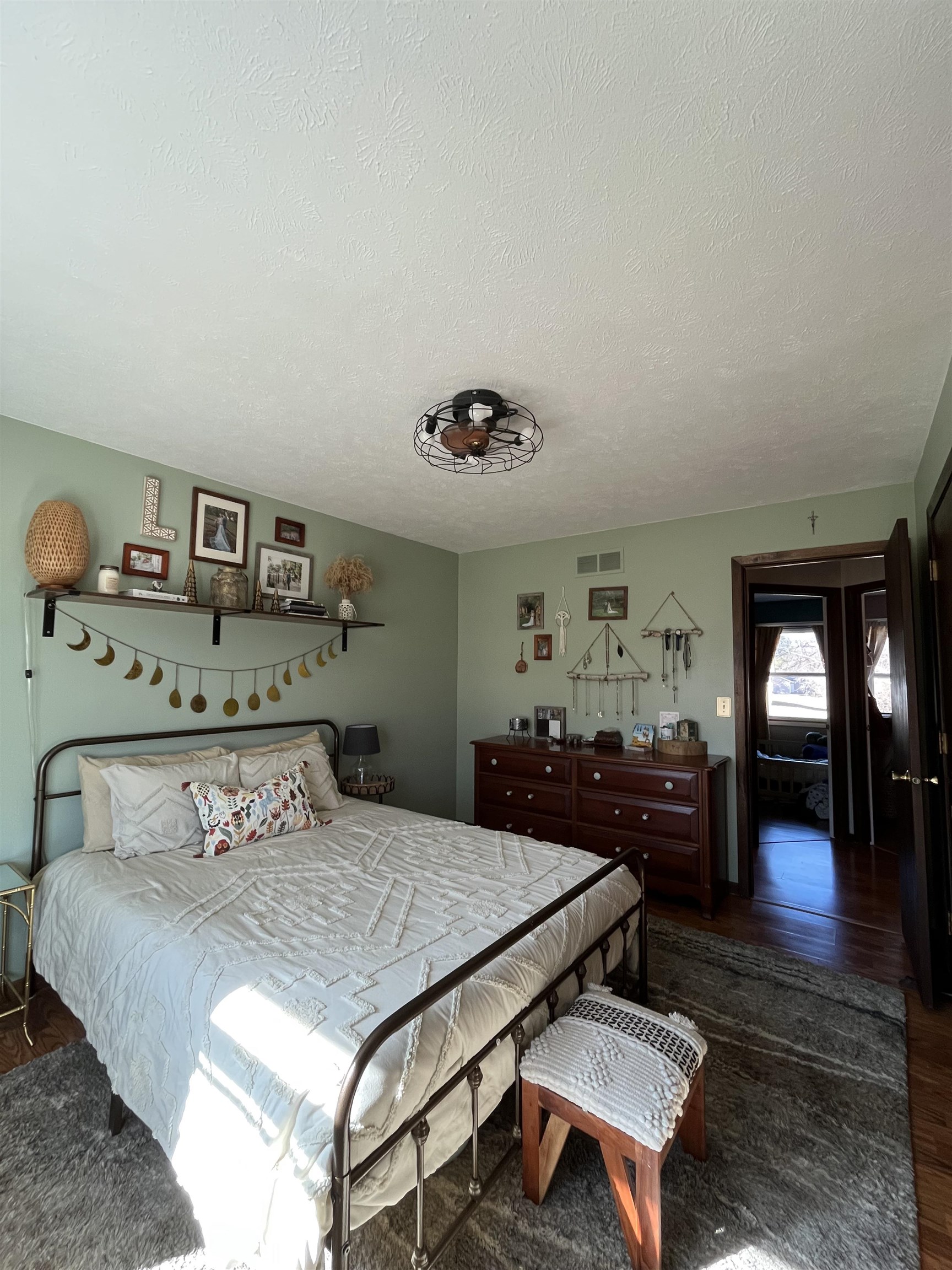 300 Lamplighter Loop Southeast Poplar Grove, IL 61065 - Photo 16 of 29 a bedroom with a bed and wooden floor