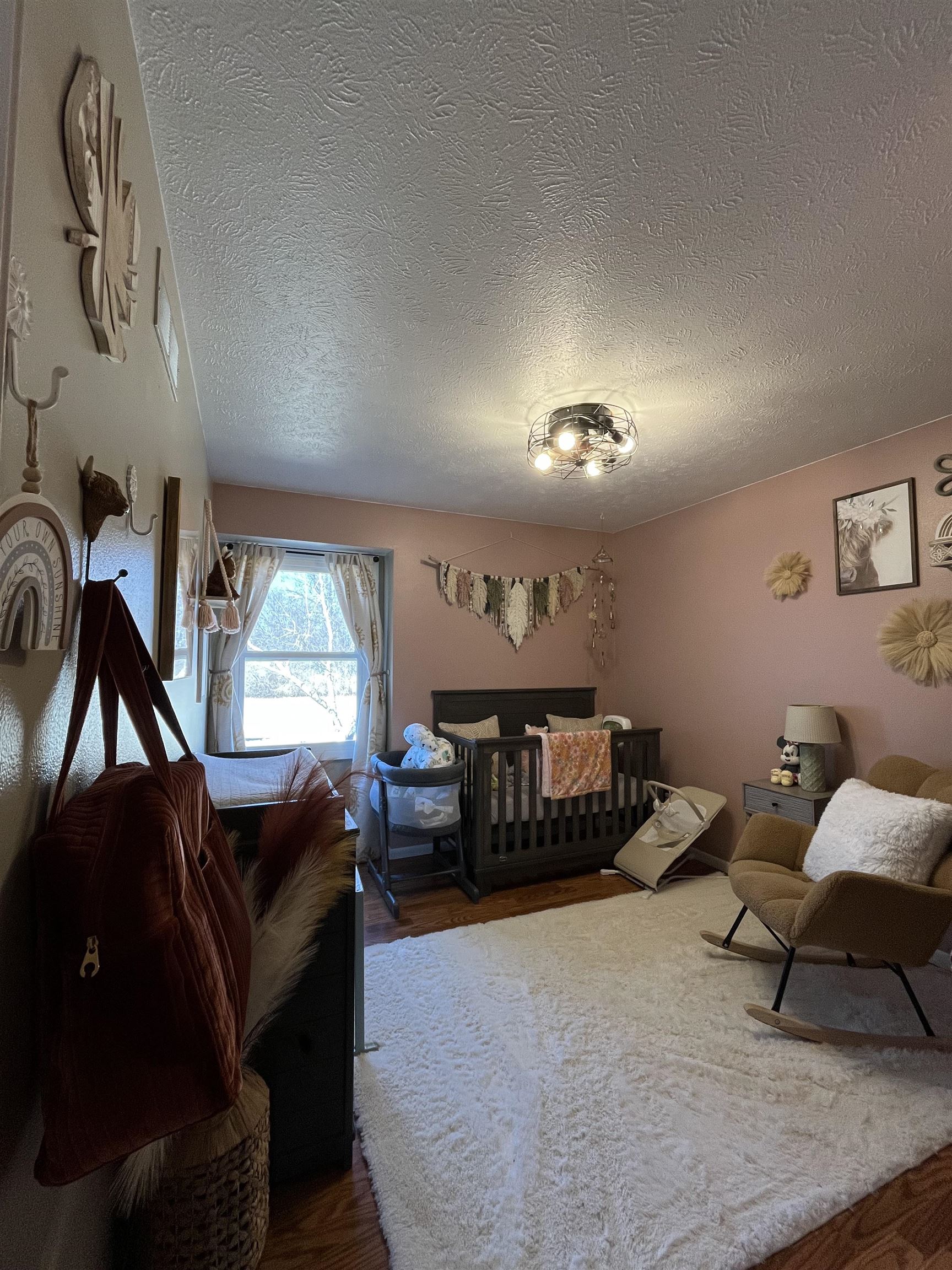300 Lamplighter Loop Southeast Poplar Grove, IL 61065 - Photo 19 of 29 a living room with furniture and a chandelier