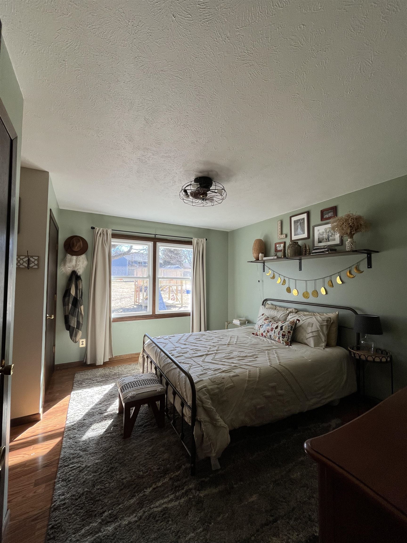 300 Lamplighter Loop Southeast Poplar Grove, IL 61065 - Photo 28 of 29 a bedroom with a bed and wooden floor