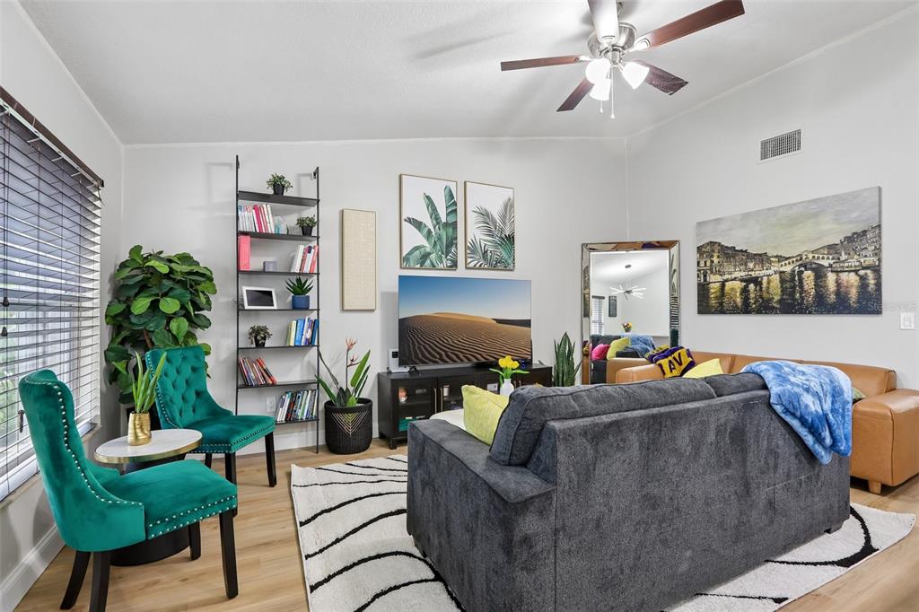 1525 Kestrel Way Brandon, FL 33511 - Photo 13 of 48 a living room with furniture and a potted plant