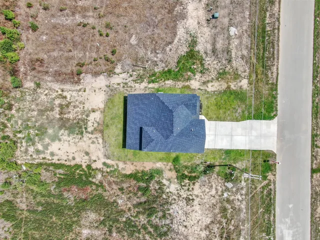 a view of a lake with a big yard