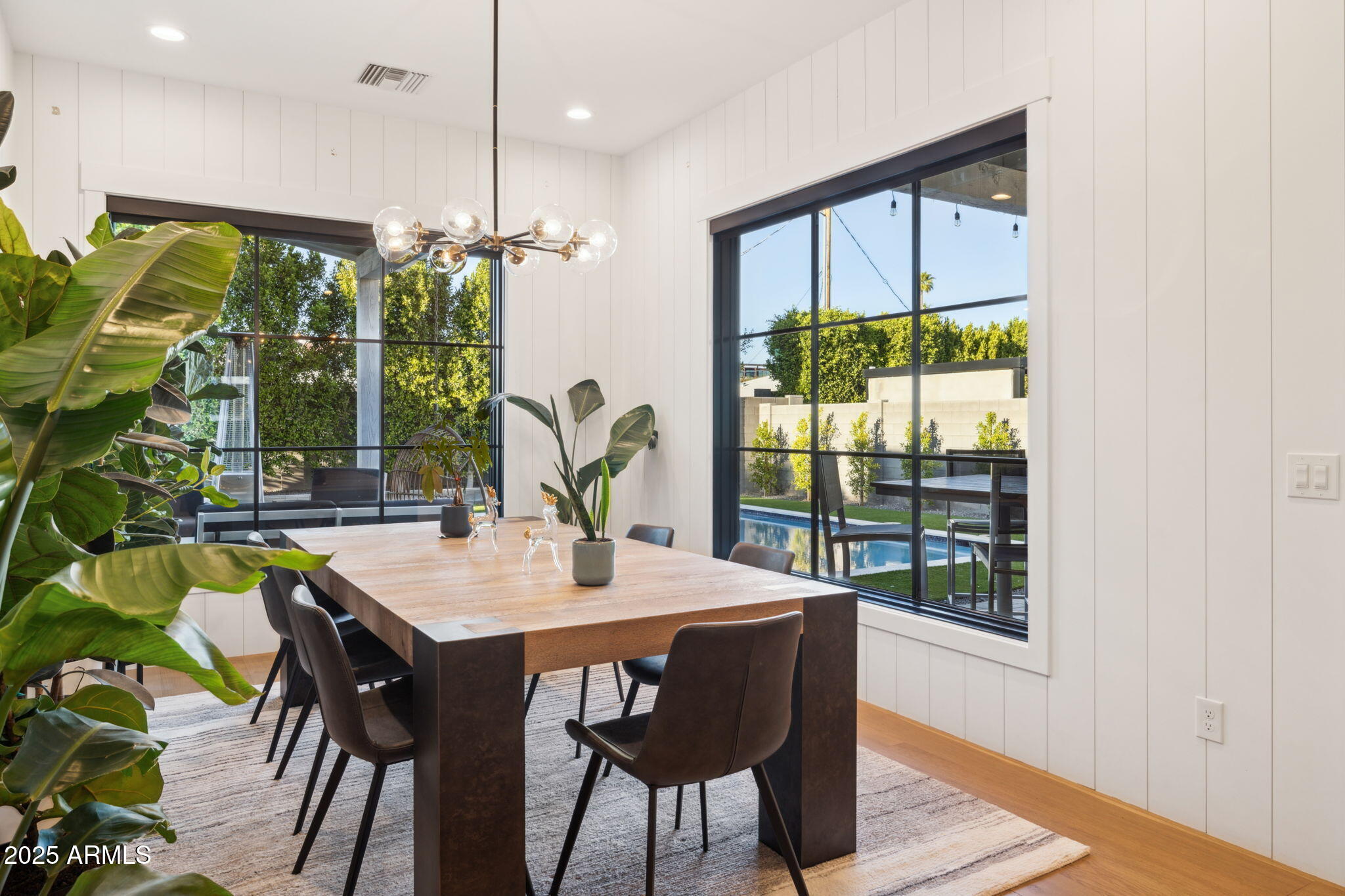 3530 East Glenrosa Avenue Phoenix, AZ 85018 - Photo 15 of 41 a view of a dining room with furniture window and outside view