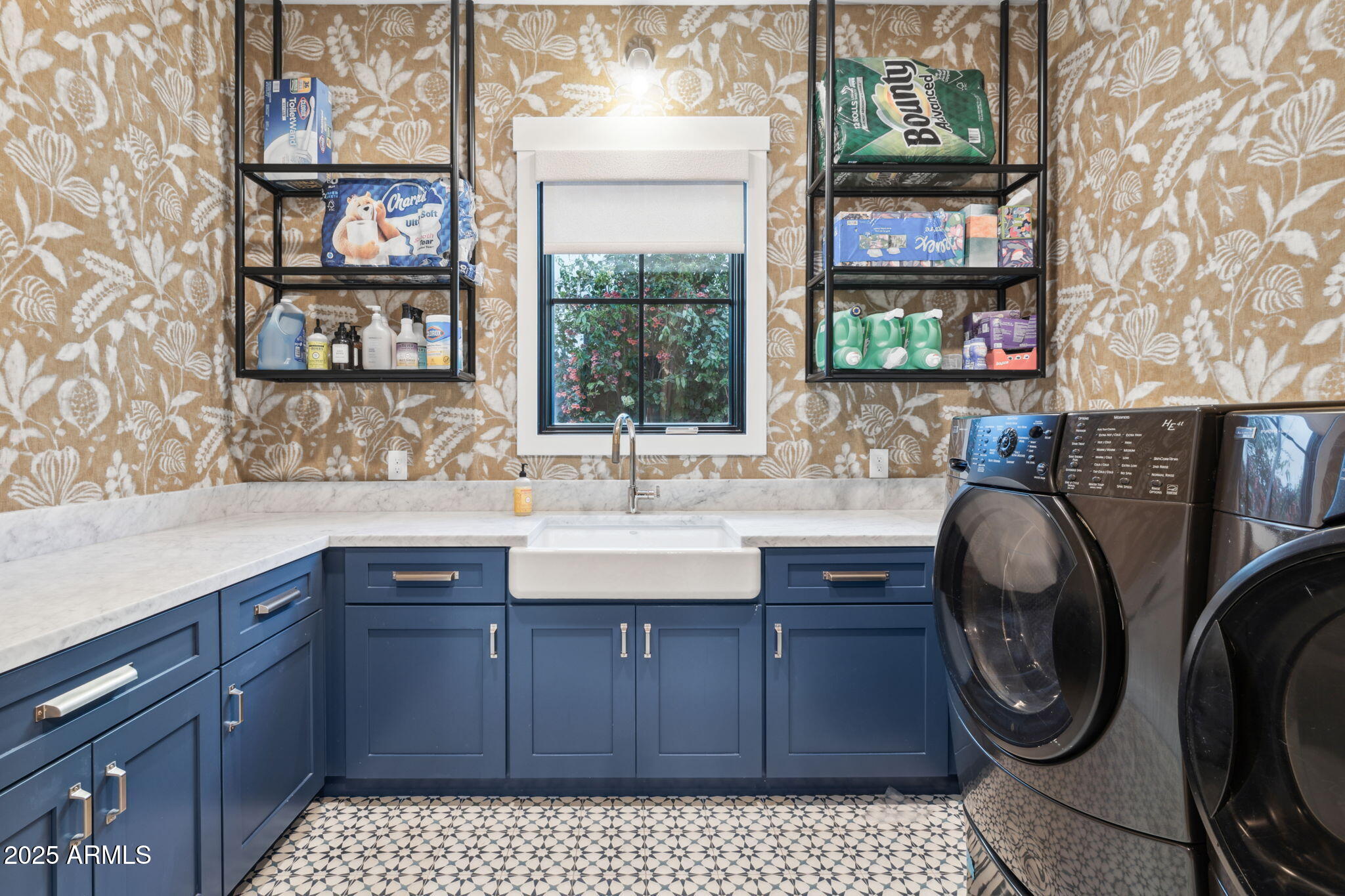 3530 East Glenrosa Avenue Phoenix, AZ 85018 - Photo 24 of 41 a bathroom with a sink a toilet and a shower curtain