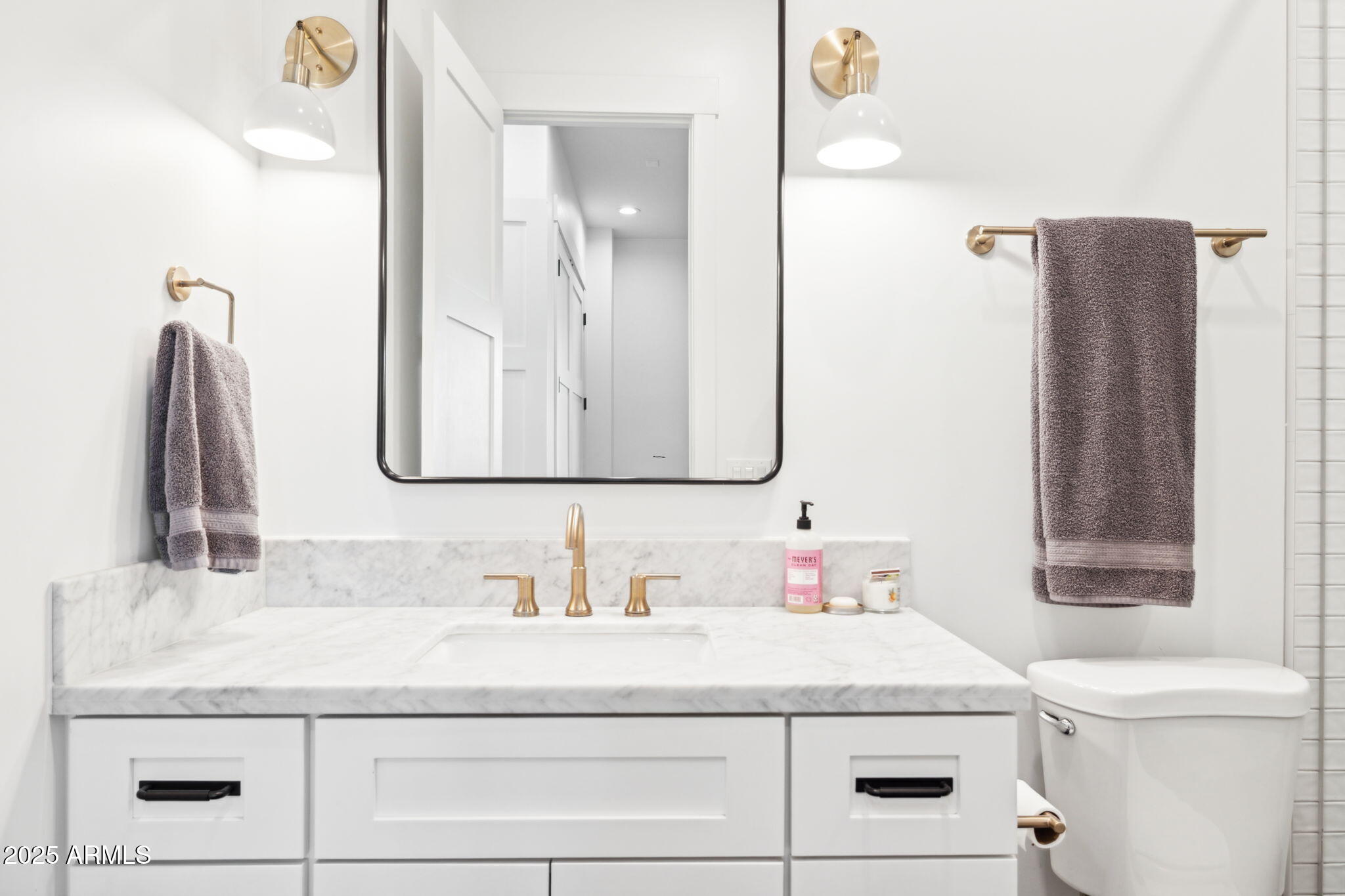 3530 East Glenrosa Avenue Phoenix, AZ 85018 - Photo 26 of 41 a bathroom with a granite countertop sink and a mirror