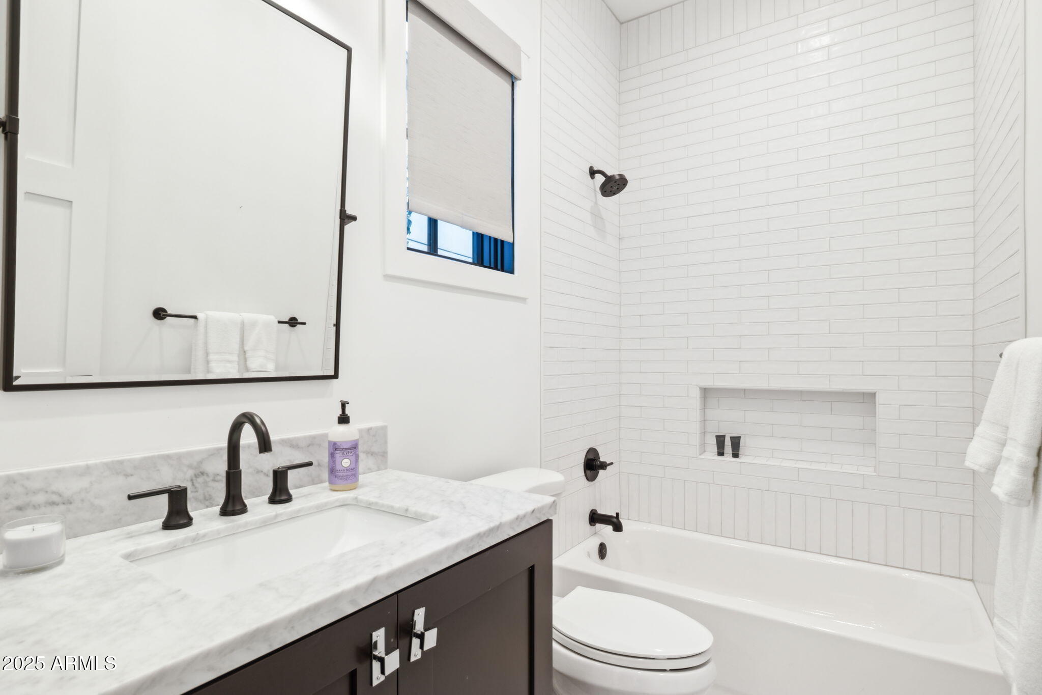 3530 East Glenrosa Avenue Phoenix, AZ 85018 - Photo 30 of 41 a bathroom with a granite countertop sink toilet and shower