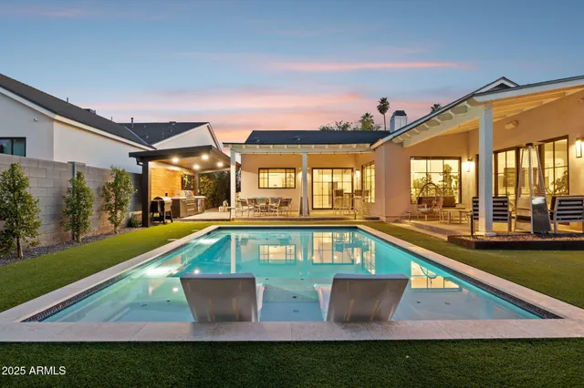 swimming pool with outdoor seating