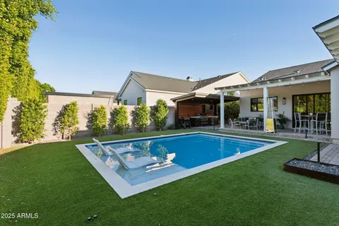 a view of outdoor space yard swimming pool and patio