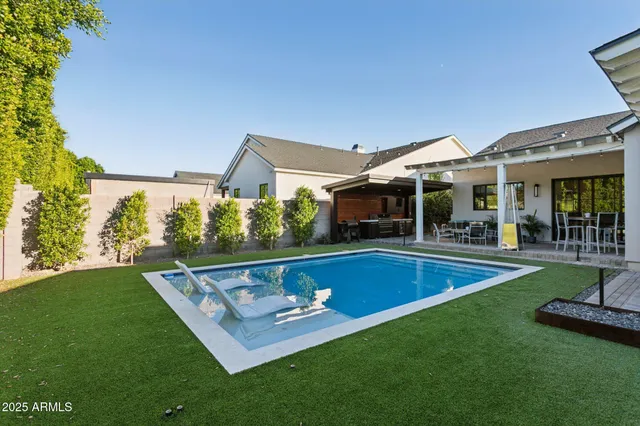 a view of outdoor space yard swimming pool and patio