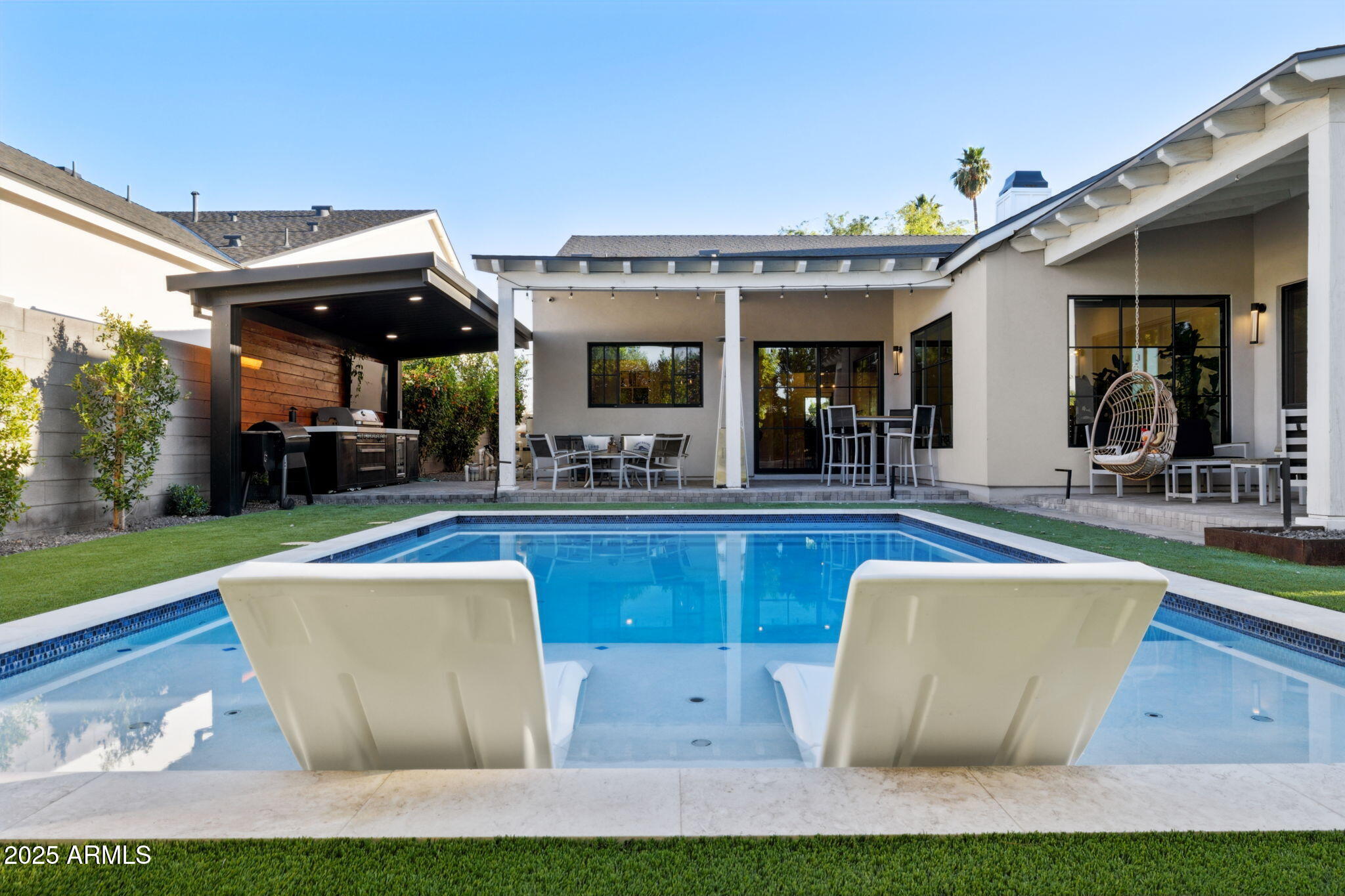3530 East Glenrosa Avenue Phoenix, AZ 85018 - Photo 40 of 41 a view of outdoor space yard swimming pool and patio