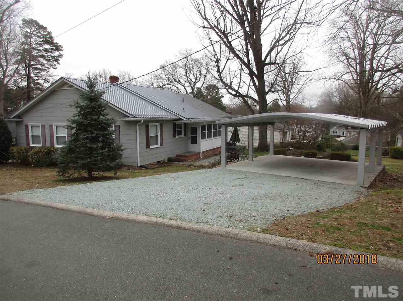 511 Gordon Street Roxboro, NC 27573 - Photo 2 of 25 front view of house with a yard