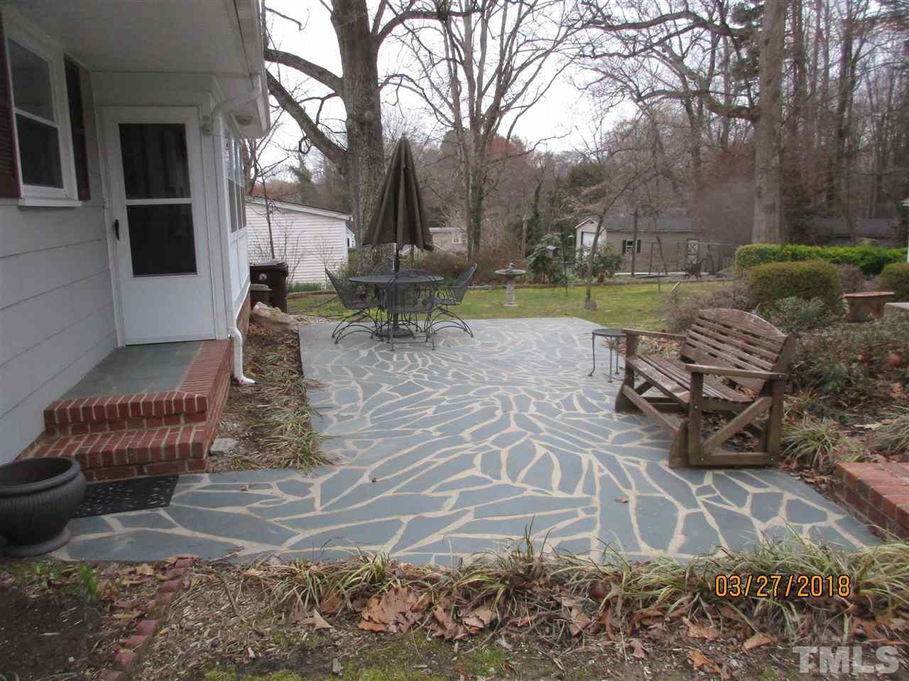 511 Gordon Street Roxboro, NC 27573 - Photo 21 of 25 a view of a yard with furniture