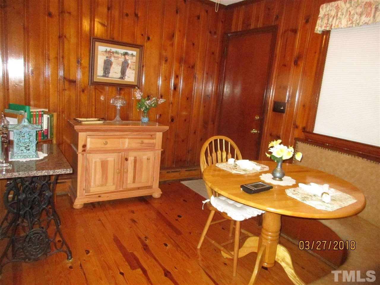 511 Gordon Street Roxboro, NC 27573 - Photo 9 of 25 a view of a table and chairs in a room