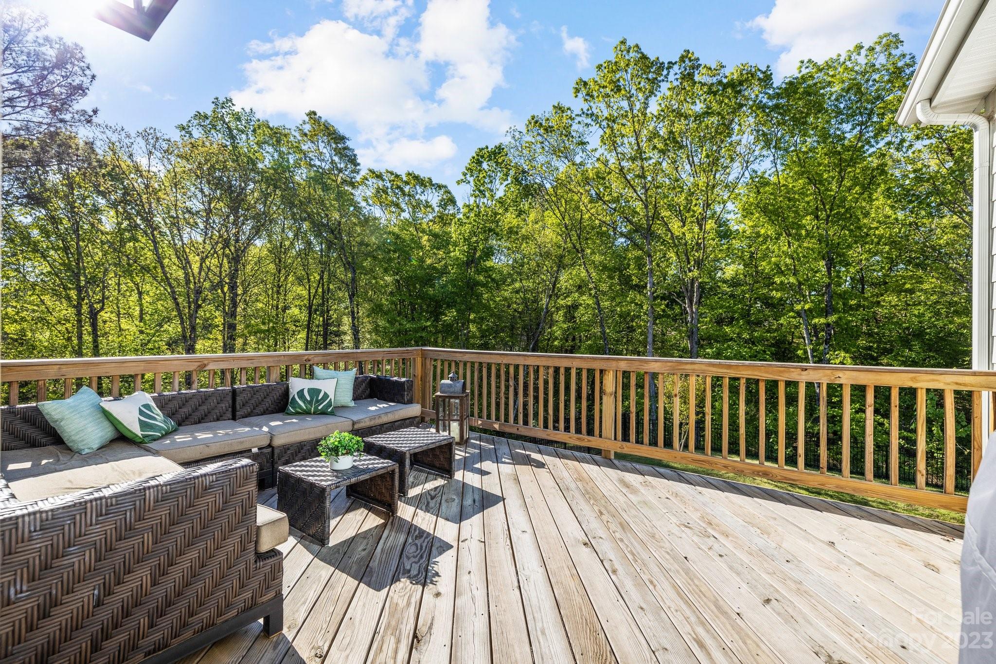 6284 Six String Court Fort Mill, SC 29708 - Photo 34 of 39 a balcony with wooden floor and outdoor seating