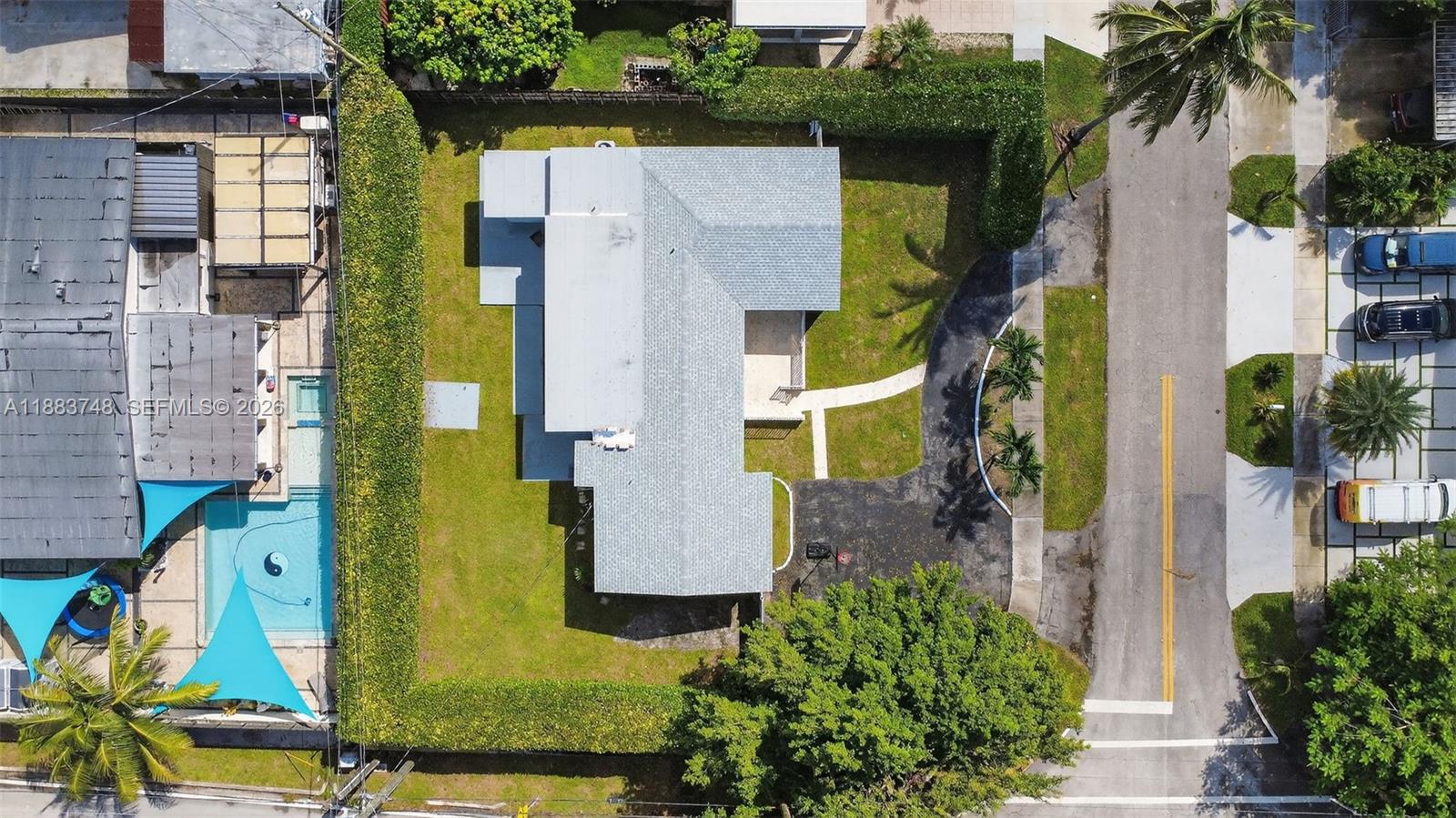 8371 Southwest 32nd Terrace Miami, FL 33155 - Photo 36 of 48 an aerial view of a house with a yard swimming pool and outdoor seating