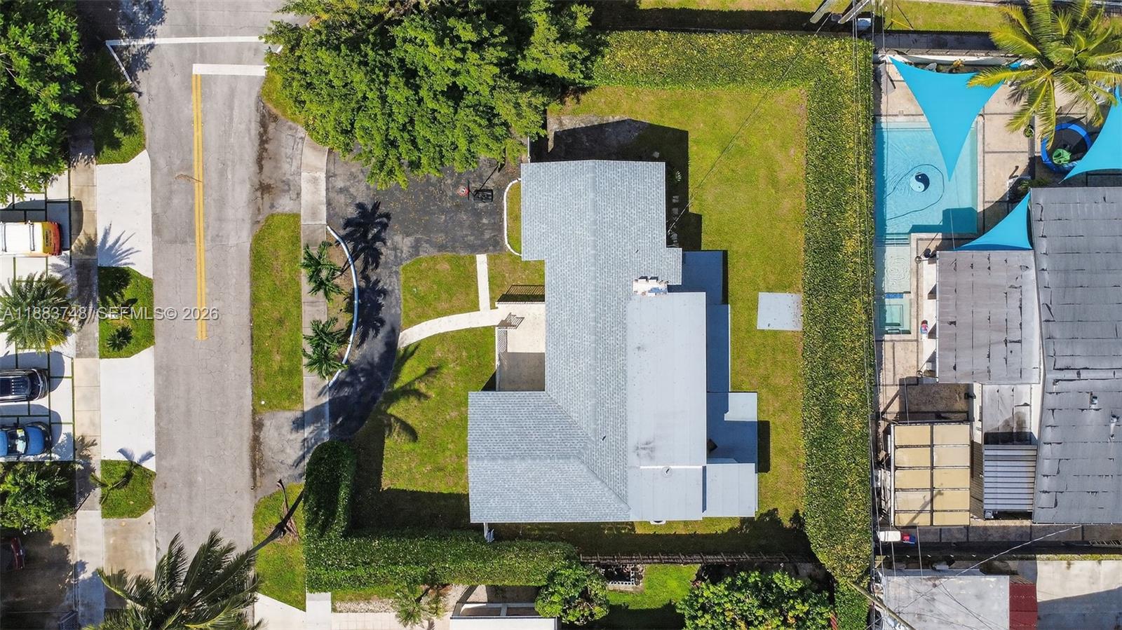 8371 Southwest 32nd Terrace Miami, FL 33155 - Photo 37 of 48 an aerial view of a house with a yard