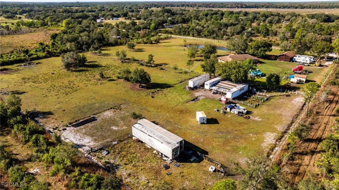 1472 Charolais Road Northwest LaBelle, FL 33935 - Photo 50 of 50 an aerial view of residential houses with outdoor space