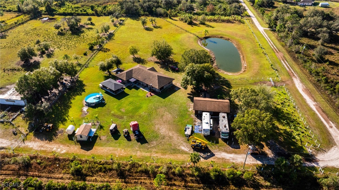 1472 Charolais Road Northwest LaBelle, FL 33935 - Photo 6 of 50 an aerial view of a swimming pool