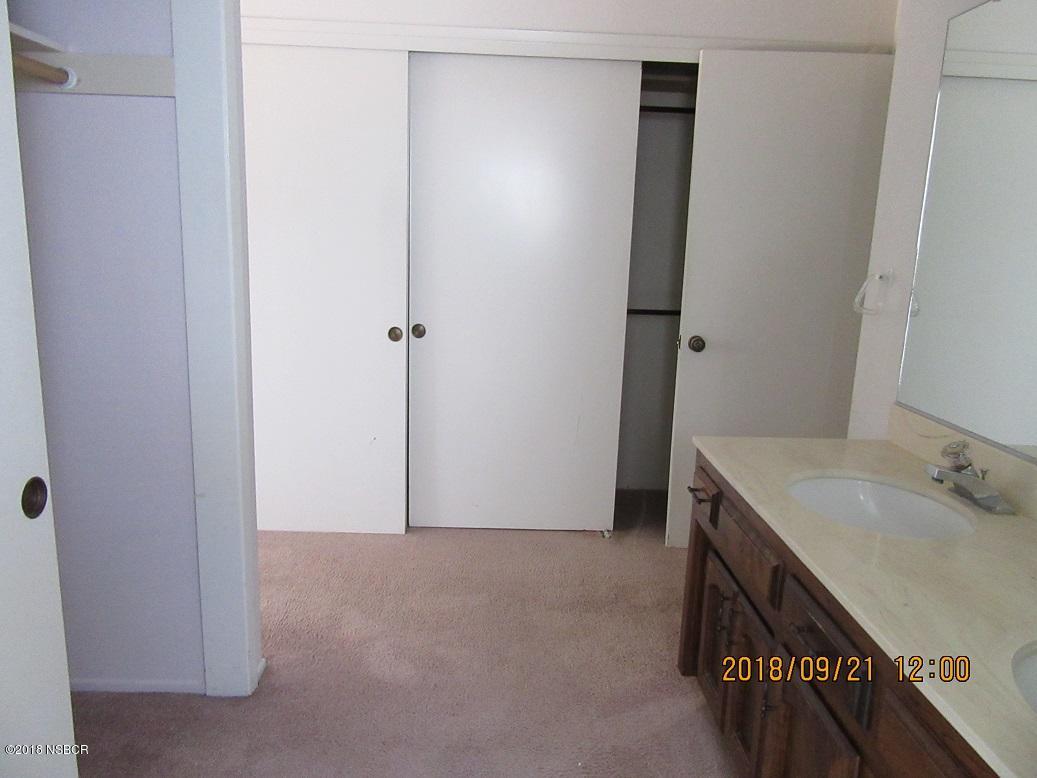 4376 Rigel Avenue Lompoc, CA 93436 - Photo 12 of 20 a bathroom with a sink and a mirror