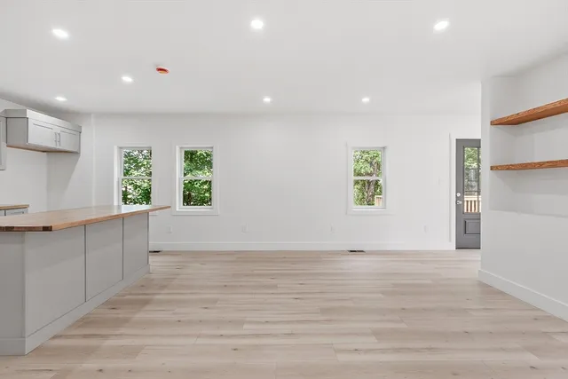 a view of an empty room and window