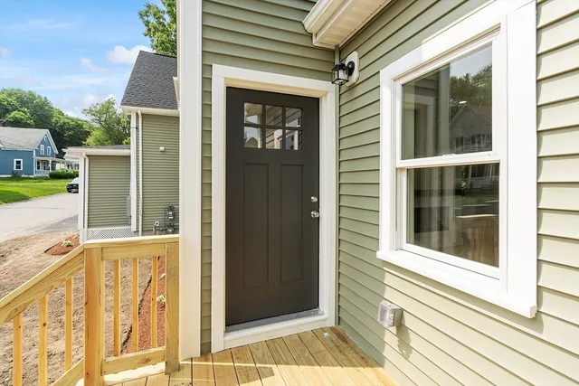 a view of a brick house with a window