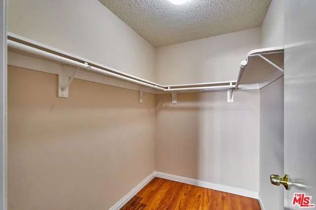 a view of a room with racks on the wall