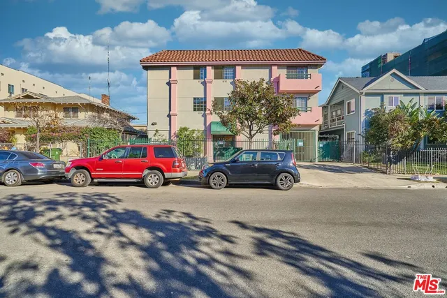 a view of a cars parked in front of a building