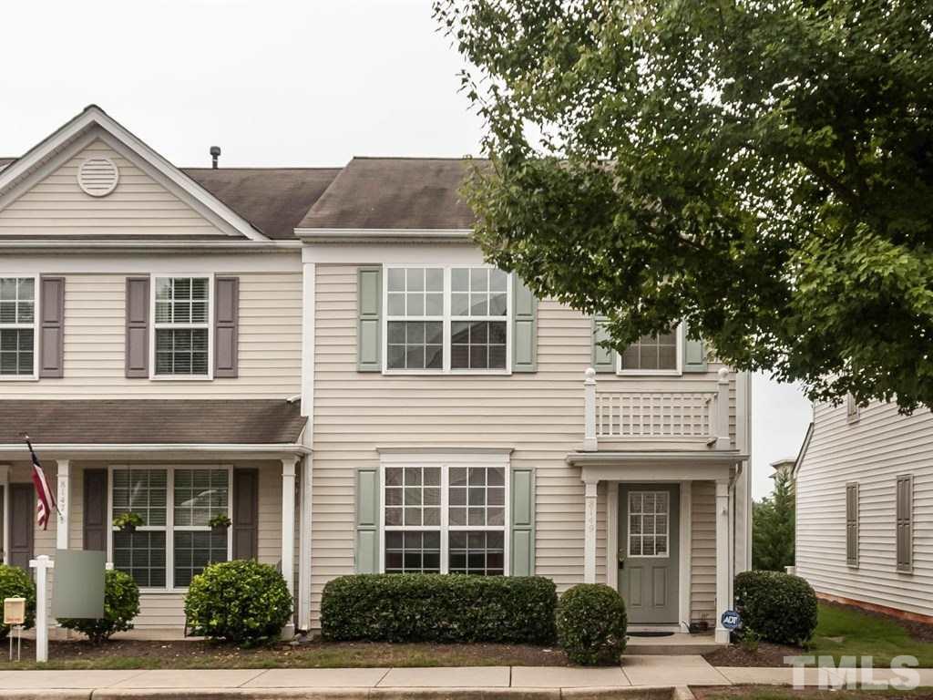 8149 Rhiannon Road Raleigh, NC 27613 - Photo 1 of 25 a front view of a house with garden