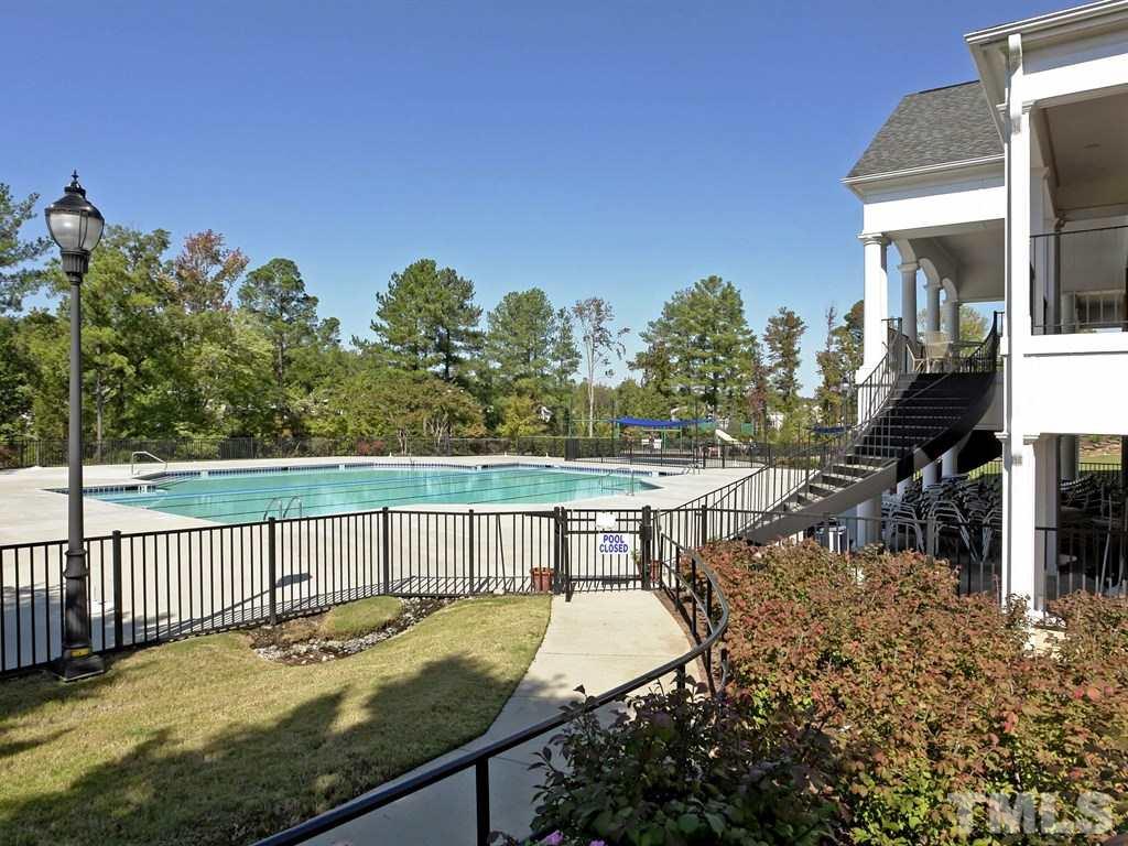 8149 Rhiannon Road Raleigh, NC 27613 - Photo 25 of 25 a view of a backyard with sitting area