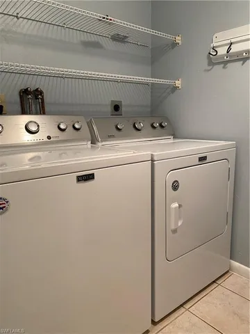 a view of backyard with large trees