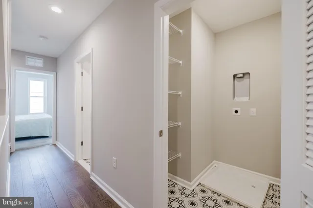 a bathroom with a sink and a shower