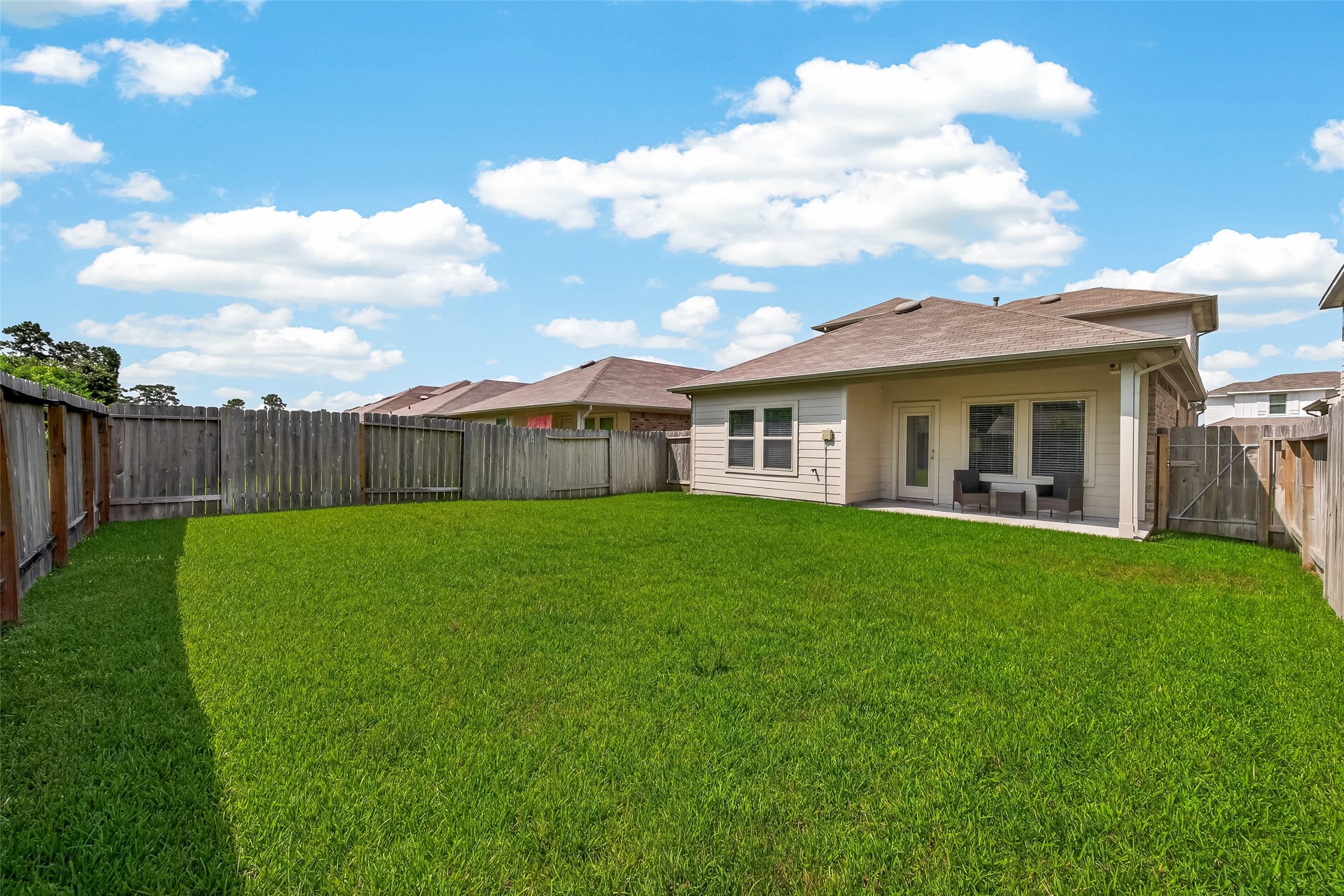 22446 Forest Gorge Lane Spring, TX 77373 - Photo 36 of 40 Fully Fenced in Yard with Covered Patio.