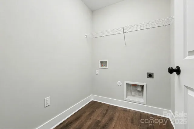 a view of a room with rack on the wall