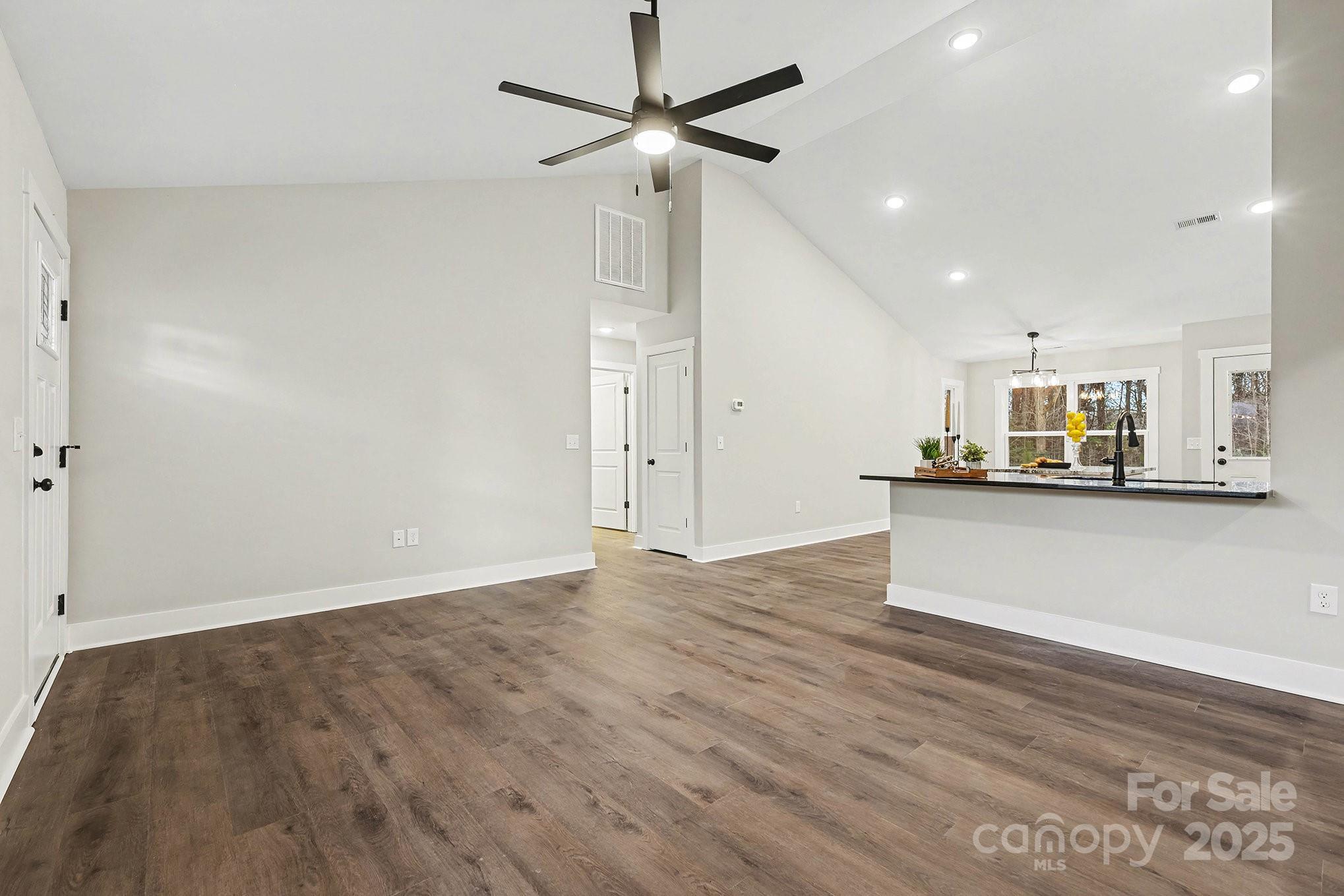 1230 Faith Road Salisbury, NC 28146 - Photo 5 of 26 a view of kitchen with refrigerator and window