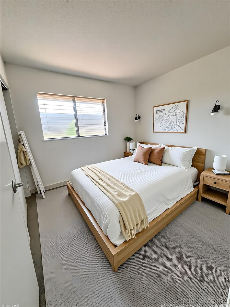 92-993 Makakilo Drive, Unit 45 Kapolei, HI 96707 - Photo 15 of 15 a bedroom with a bed and a window