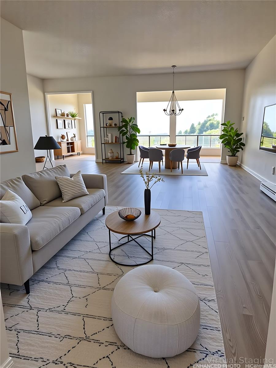 92-993 Makakilo Drive, Unit 45 Kapolei, HI 96707 - Photo 2 of 15 a living room with furniture and a large window